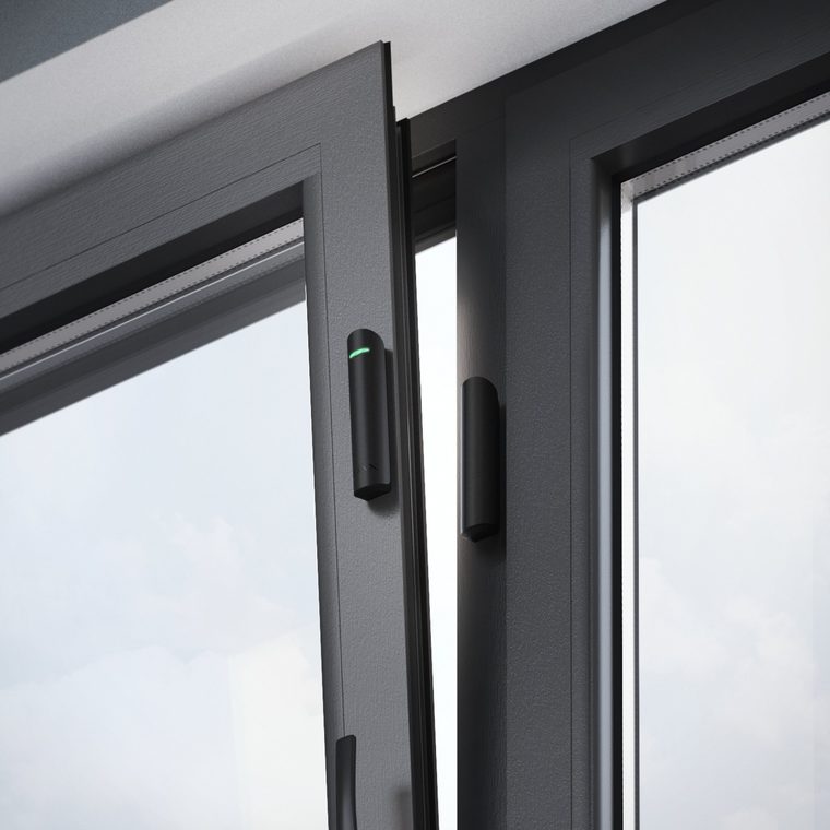 Ajax DoorProtect sensor on a window frame
