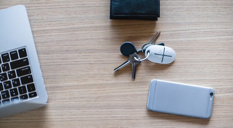 Ajax SpaceControl key fob on a set of keys